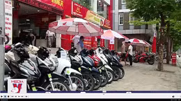 Người Việt giảm mua xe máy