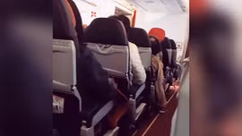 Xem video máy bay AirAsia rung lắc như máy giặt, hành khách sợ phát khóc