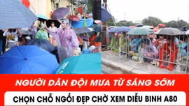 Người dân đội mưa chờ xem diễu binh