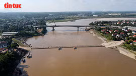 Bà con đôi bờ sông Hồng phấn khởi chờ ngày khánh thành cầu Phong Châu